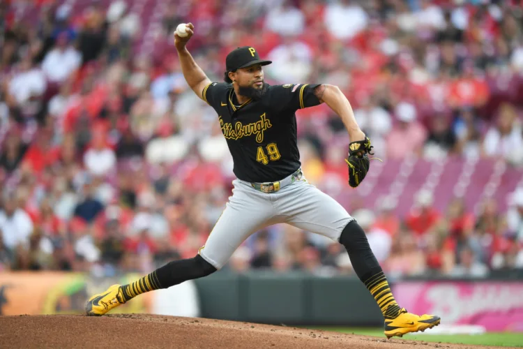 Pirates miss out on double play, lose to Reds